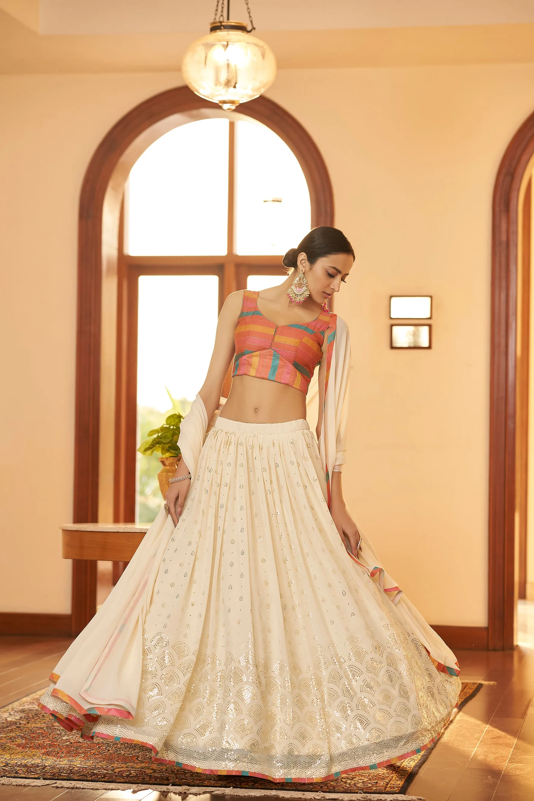 Beige Embellished Mukaish Work Georgette Semi Stitched Lehenga