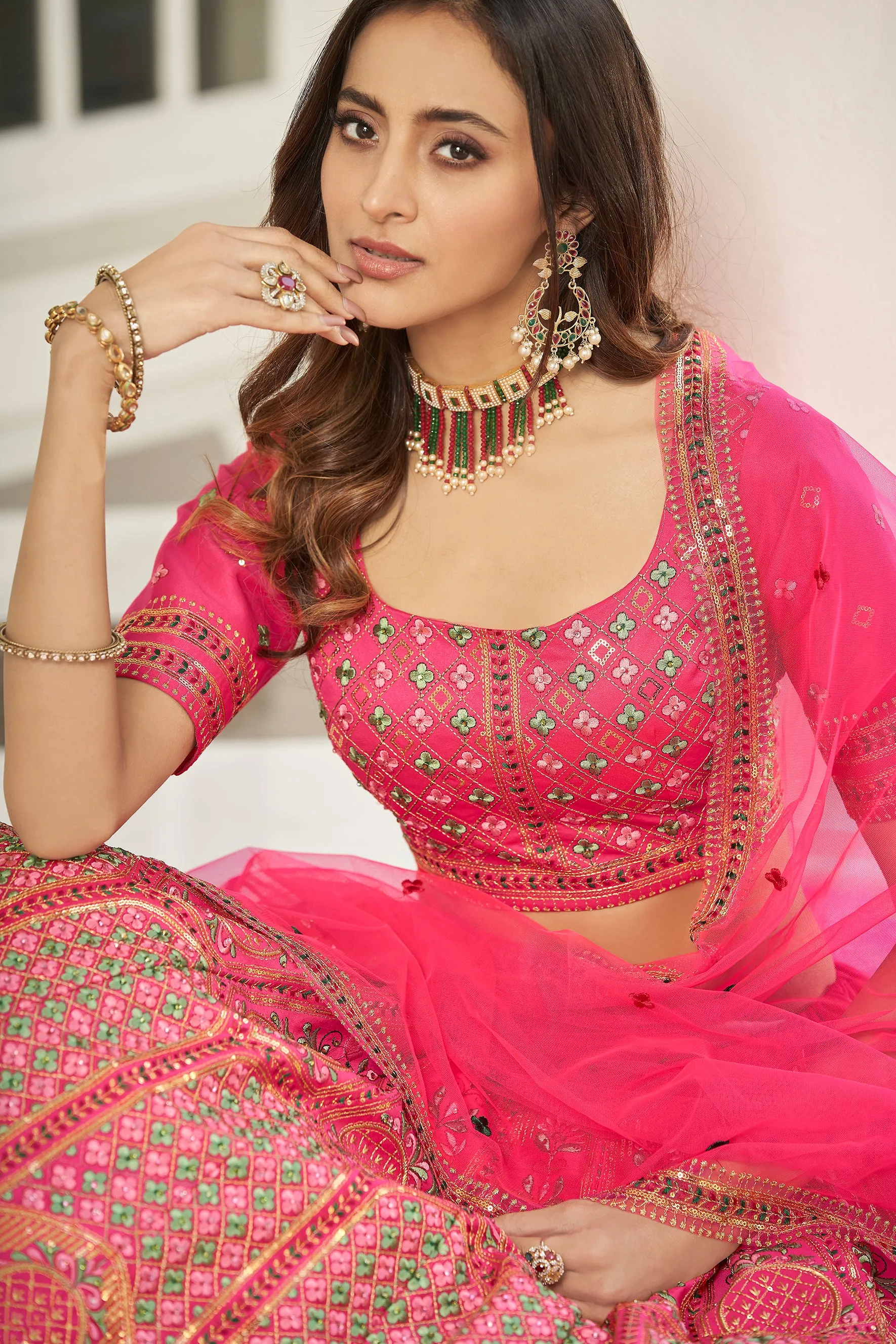 Hypnotizing Deep Pink Thread And Sequins Embroidered Silk Semi Stitched Lehenga